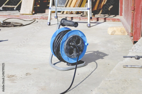Obraz Power plug reel near construction zone