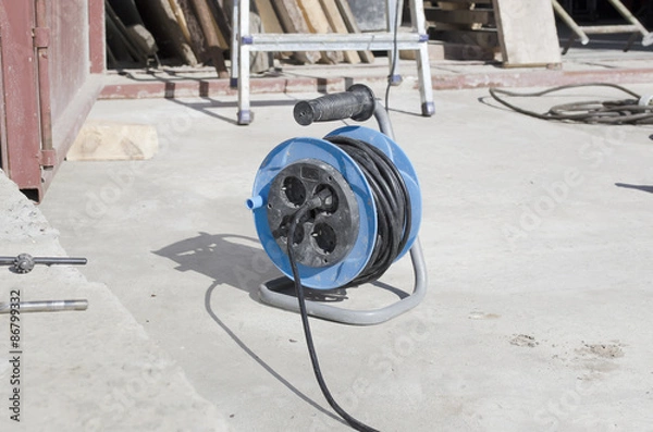 Obraz Power plug reel near construction zone