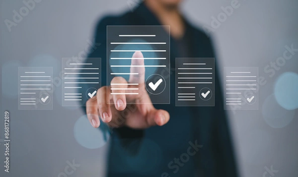 Fototapeta Electronic signature concept. Businessman sign electronic documents in digital documents, Signing contract to approve a business project, paperless document office.