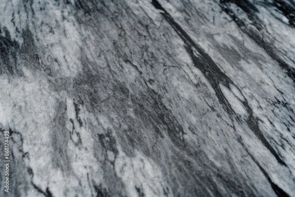 Fototapeta Gray marble texture with natural white veining patterns. Smooth, polished stone surface for countertops