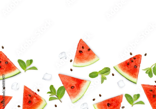 Fototapeta background of watermelon slices, mint leaves and ice on a white isolated background