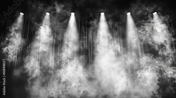 Obraz Five spotlights illuminating a dark stage with smoke