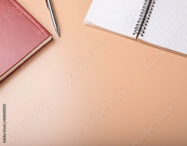Fototapeta 開かれたノートとペンと閉じられた本