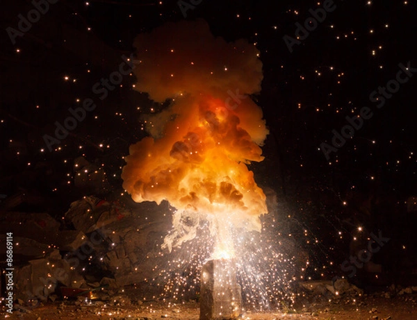 Obraz Realistic fiery explosion busting over a black background