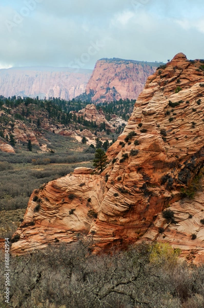 Fototapeta Sandstone rock formations surrounding Virgin, Utah.