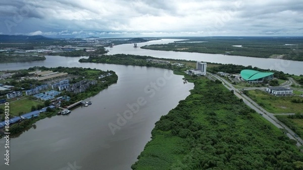 Fototapeta Kuching, Malaysia - July 1 2024: The Isthmus with the Twin Towers, Barrage and Borneo Convention Centre Kuching