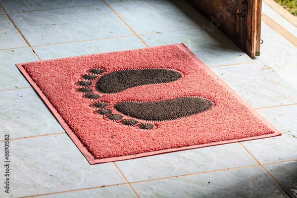 Obraz foot on floor mat with