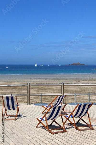 Fototapeta chaises-longues