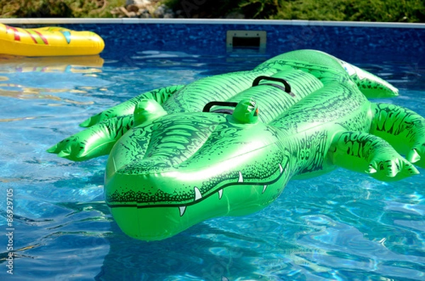 Fototapeta Inflatable crocodile in the pool