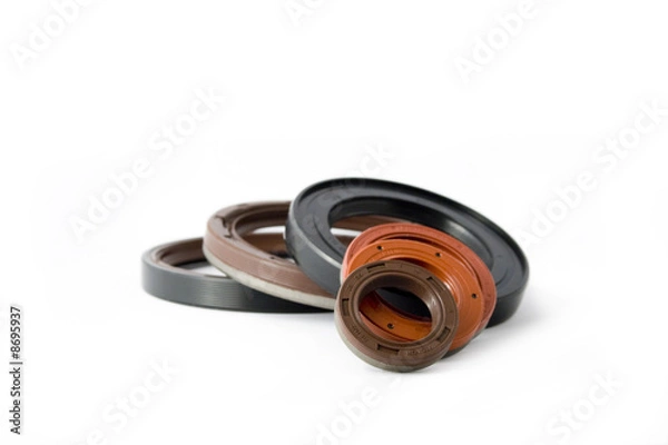 Fototapeta oil seals on white endless background