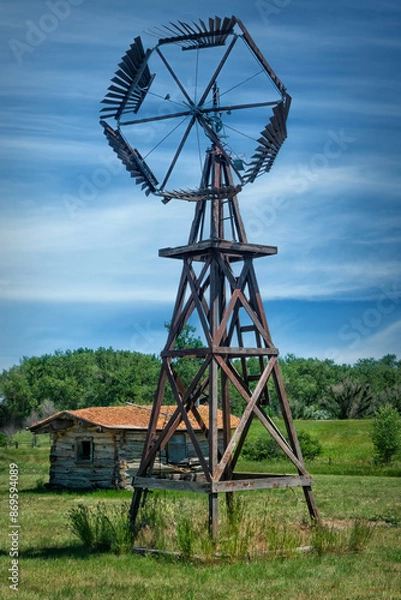 Obraz old windmill and log cabin
