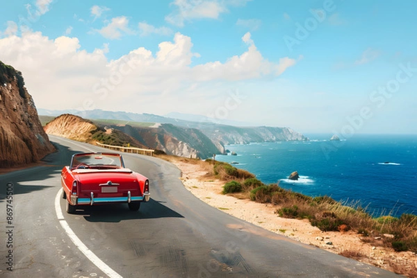 Fototapeta A high-quality image of a convertible driving along a scenic coastal road, with the ocean on one side and cliffs on the other, capturing the freedom of a road trip