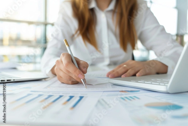 Fototapeta Businesswoman Analyzing Financial Data.