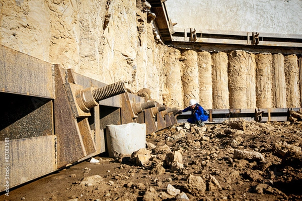 Fototapeta worker in the ditch