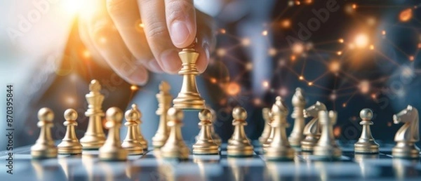 Fototapeta Hand placing a chess piece, close-up, strategic decision, business concept, leadership