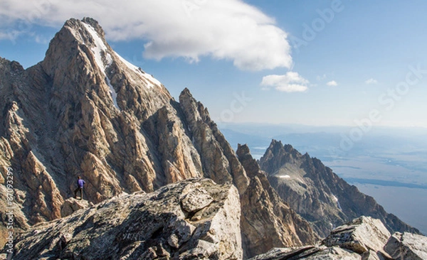 Obraz climber atop the tetons