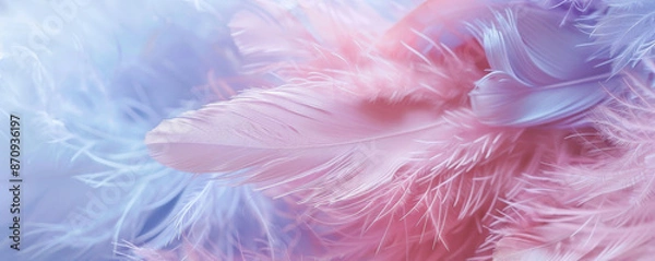 Fototapeta A close-up of delicate, fluffy feathers in pastel shades of pink, lavender, and baby blue. The soft hues and textures evoke a sense of calm and lightness.