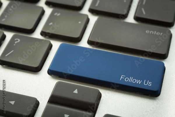 Obraz Laptop keyboard with typographic FOLLOW US button