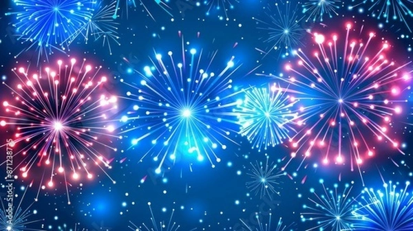 Fototapeta The image captures an array of bright fireworks exploding in the night sky with vibrant colors of blue and red, creating a festive and celebratory atmosphere.
