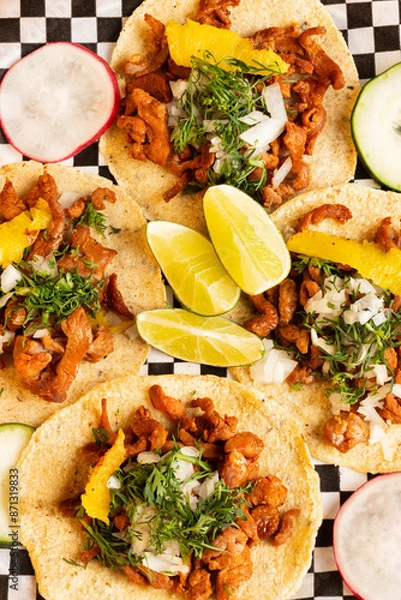 Obraz Mexican tacos with condiments and vegetables