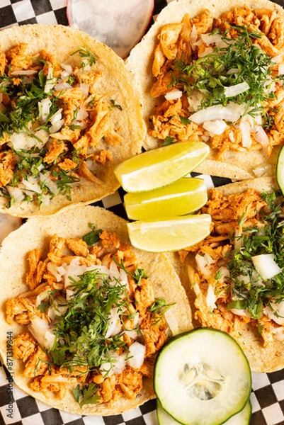 Obraz Mexican tacos with condiments and vegetables