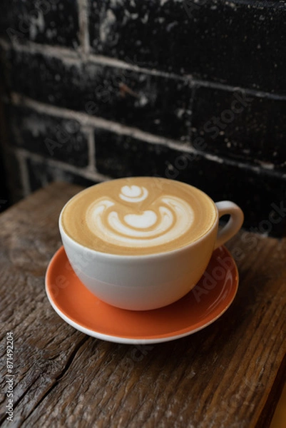 Obraz cup of coffee latte brick background