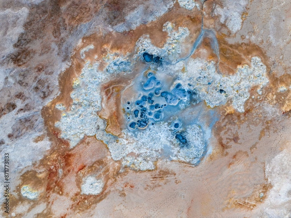 Obraz View from above, stunning aerial view of Námafjall Geothermal Area also known as Hverir with smoking fumaroles and boiling mud pots, surrounded by sulphur crystals of many different colours, Iceland.