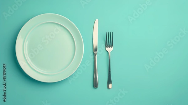 Fototapeta Cutlery, fork, knife, spoon and empty plate on a colored background. AI Generated