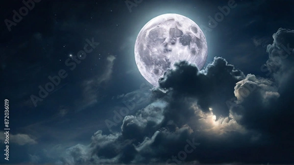 Fototapeta Majestic full moon on the dark blue sky creating a magical and ethereal atmosphere.