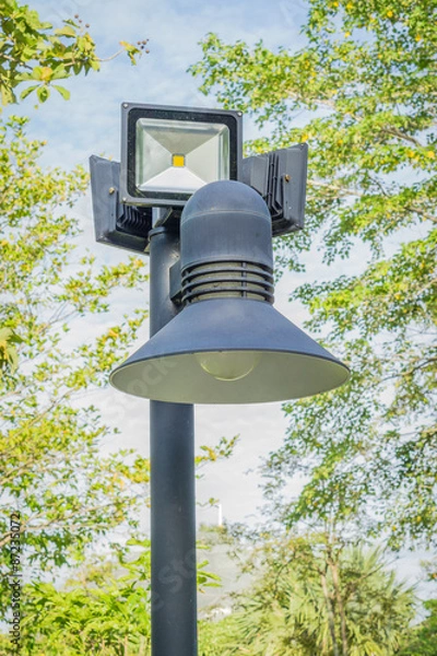 Obraz Lamp post against blue sky