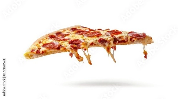 Fototapeta Cheesy flying pizza slice with pepperoni, isolated on a white background