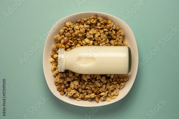 Fototapeta ミルク瓶とグラノーラのお洒落なイメージ2