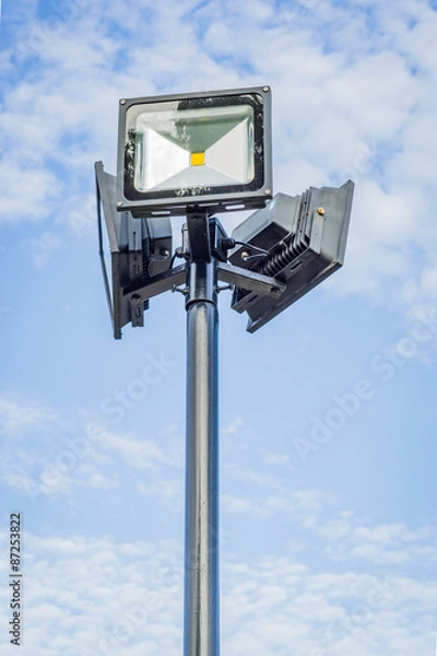 Obraz Lamp post against blue sky
