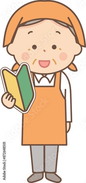 Fototapeta 初心者マークを持っているエプロン姿のシニア女性全身