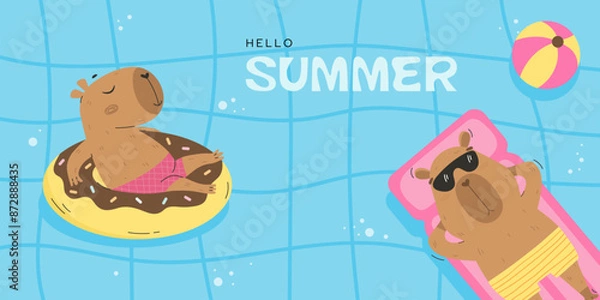 Fototapeta Funny capybaras floating in swimming pool