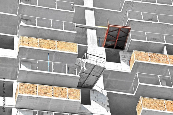 Fototapeta Building construction site from concrete and brick