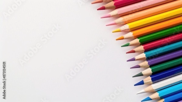 Fototapeta Colored pencils on plain background with space for text