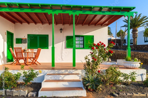 Fototapeta Typical white house with green door and windows in Las Brenas village, Lanzarote, Canary Islands, Spain