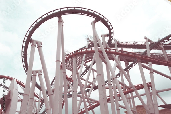 Fototapeta a roller coaster's loop with vintage style