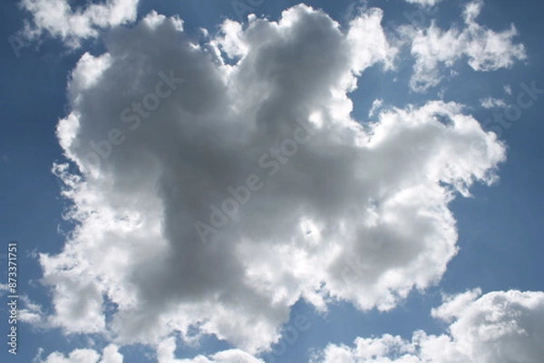 Obraz Clouds in a blue sky ,white fluffy clouds on a back ground of blue sky on a summers day Knottingley West Yorkshire In UK
