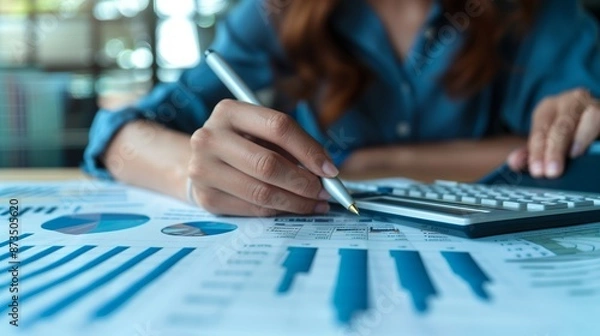 Obraz Business Financing, budget management, tax calculation, accounting banking concept, Businesswoman doing finances and calculating financial report with business graph growth chart