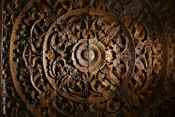 Obraz Pattern of flower carved on wood background.