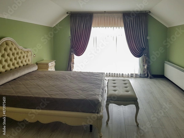 Obraz bed and curtains in the bedroom