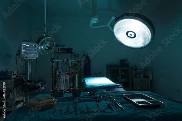 Obraz operating room with equipment in hospital , blue filter
