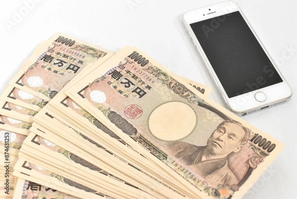 Fototapeta スマホとお金
