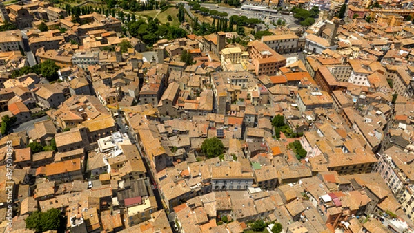 Fototapeta Aerial view of the Civic Tower in Piazza Plebiscito in Viterbo, Lazio, Italy. It is one of the symbols of the historic center of the city.
