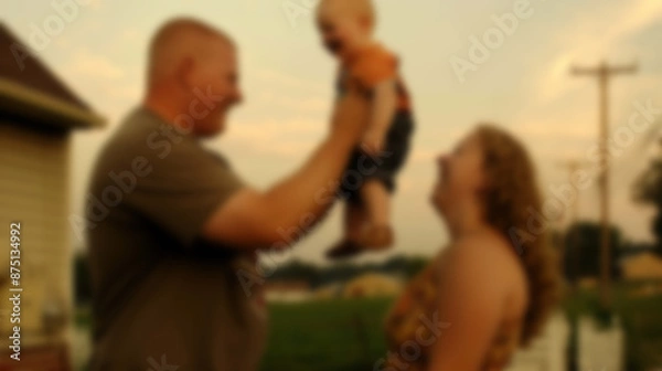 Fototapeta Blurry background image of a family spending quality time together