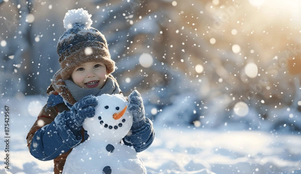 Obraz photo of a happy child building a snow man in a winter . Created using generative AI
