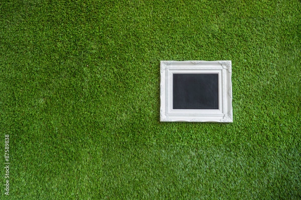 Obraz picture frame on green background