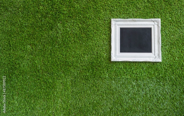 Obraz picture frame on green background